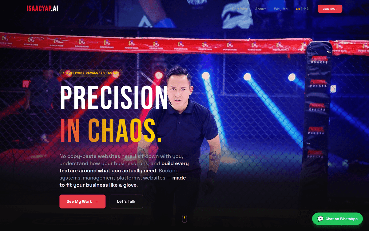 isaacyap.ai landing-page hero showing Isaac refereeing inside a lit MMA cage, the headline Precision In Chaos, a paragraph about building custom booking and management systems, See My Work and Let's Talk buttons, and a green Chat on WhatsApp button fixed to the bottom-right corner.