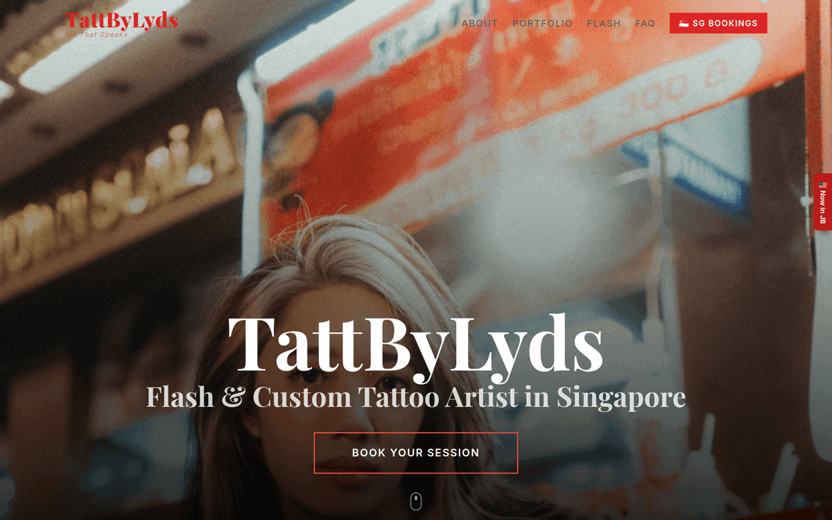 TattByLyds homepage hero on a dark street-portrait photo, with the TattByLyds wordmark, the line Flash and Custom Tattoo Artist in Singapore, and a red-outlined Book Your Session button.